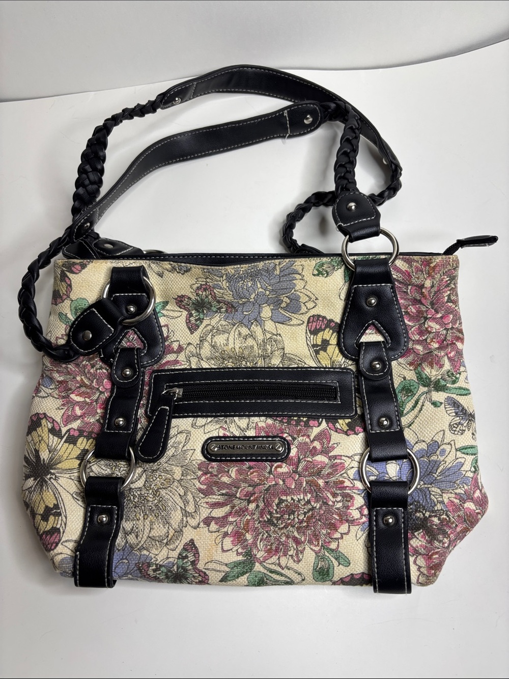Stone Mountain Garden Party Crescent Hobo shoulder bag with black strap.